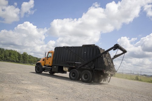 Business waste crews collecting and separating materials for recycling